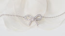 Bracelet Tiffany & Co - Bracelet Noeud  en platine et diamants 58 Facettes 32159