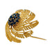 Cartier brooch in yellow gold and sapphires. 58 Facettes 31341