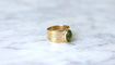 Bague 57 Bague bandeau or rose et cabochon péridot 58 Facettes