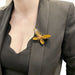 Brooch Fred Butterfly Brooch, yellow gold, coral, diamonds and tiger's eye. 58 Facettes 30760