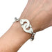 Bracelet Dinh Van “Menottes R20” bracelet in silver. 58 Facettes 31826