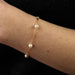 Bracelet Yellow gold bracelet and cultured pearls 58 Facettes CVBR27