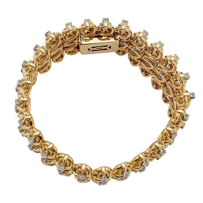 Bracelet Bracelet vintage en or rose, platine et diamants. 58 Facettes 31649