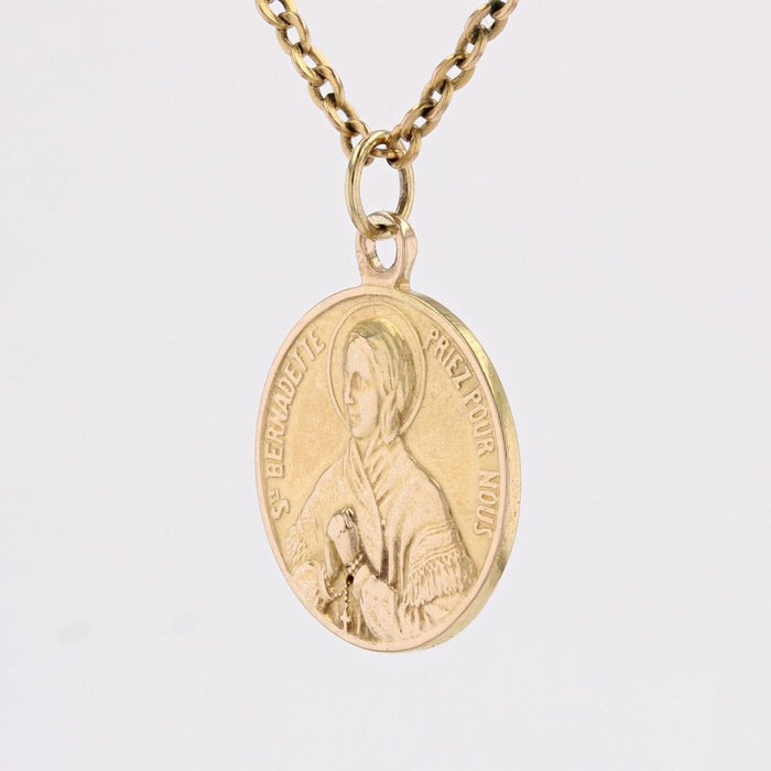 Pendentif Médaille Sainte Bernadette or jaune 58 Facettes CVP103