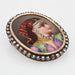Brooch Dressed enamel brooch and its diamond surround 58 Facettes 21-319