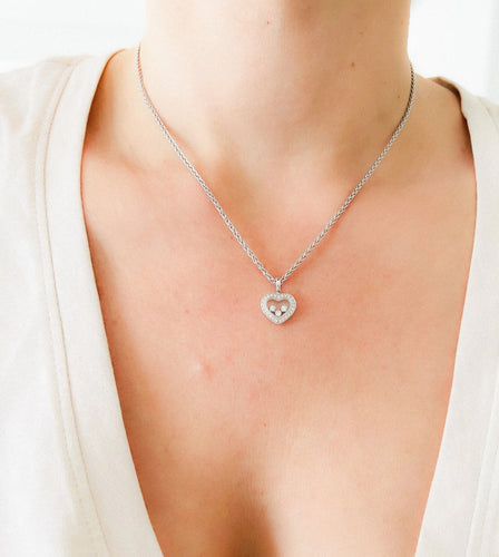 Pendentif Un pendentif or gris signé de la maison Chopard 58 Facettes