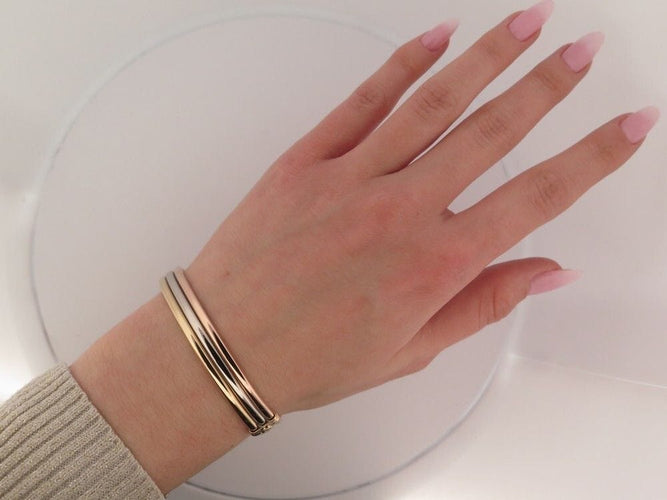 vintage bracelet CARTIER trinity jonc rigide en ors 18k t20