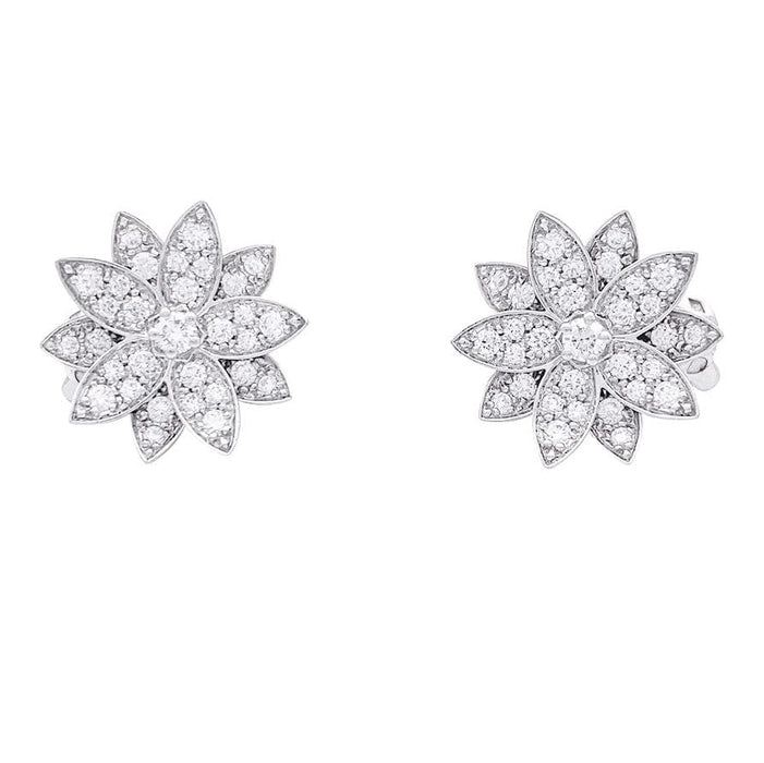 Boucles d'oreilles Boucles d'oreilles Van Cleef & Arpels "Lotus" or blanc, diamants. 58 Facettes 33565