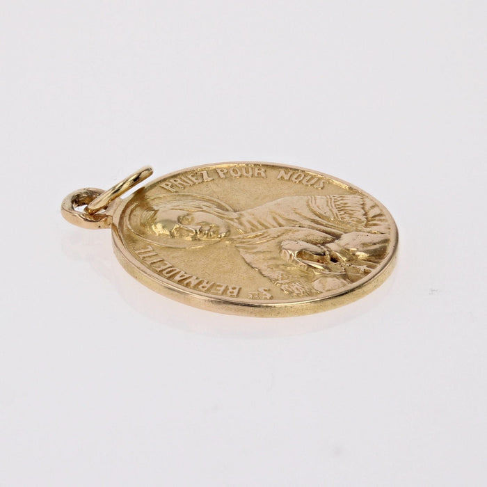 Pendentif Médaille Sainte Bernadette or jaune 58 Facettes CVP103