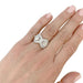 Ring 53 Platinum ring and pear-shaped diamonds. 58 Facettes 32021