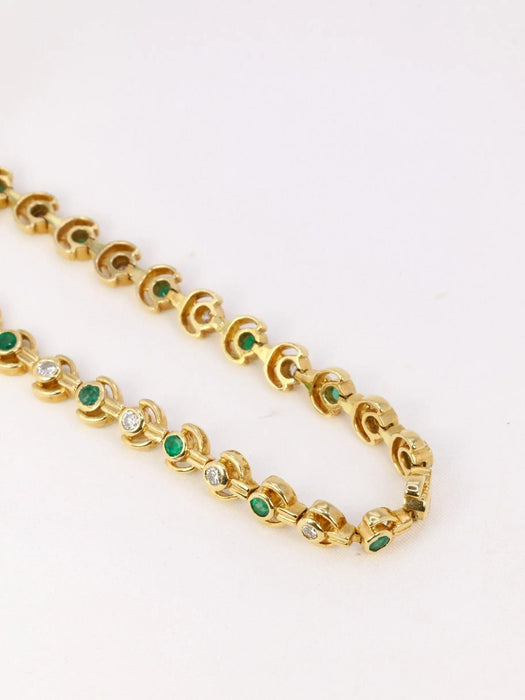 Bracelet Bracelet vintage or jaune, diamants et émeraudes 58 Facettes J93