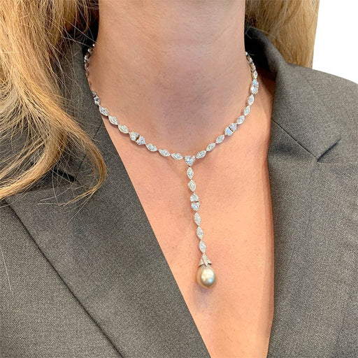 Collier Collier cravate Cartier, "Amour", or blanc, diamants, perle de Tahiti. 58 Facettes 31611