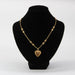 Old gold chain pendant and its heart medallion 58 Facettes 21-336