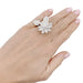 Ring 53 Van Cleef & Arpels “Lotus” ring in white gold, diamonds. 58 Facettes 33557
