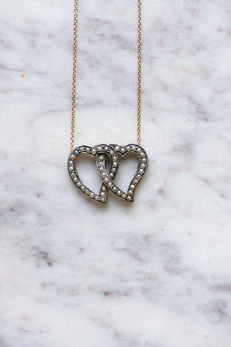 Collier Collier ancien double cœur perles 58 Facettes