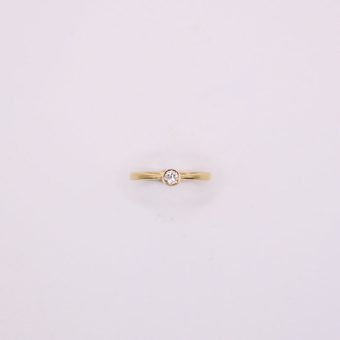 Bague Solitaire en or jaune et diamant serti clos 58 Facettes