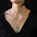 Gold chain necklace and its jade disc 58 Facettes CVCO18