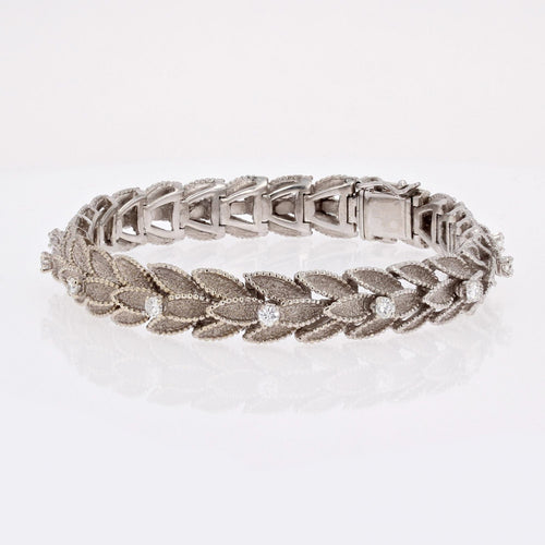 Bracelet Bracelet ancien plumes d'or blanc et diamants 58 Facettes 23-083A