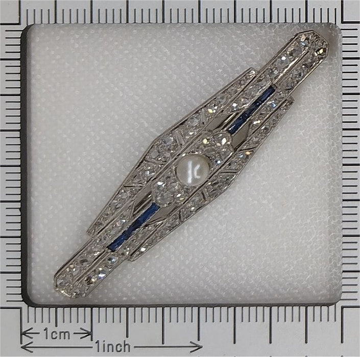 Broche Broche barre de diamants Art Déco avec saphirs et une perle 58 Facettes 22151-0089