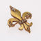 Broche Broche or jaune perles fines fleur de lys 58 Facettes 13-073