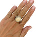 Ring 53 Pomellato ring, "Luna", natural gold, diamonds and moonstone. 58 Facettes 31730