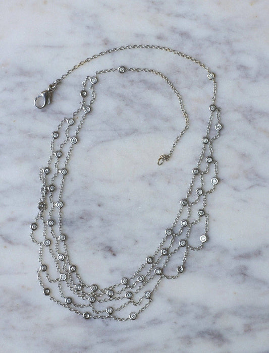 Collier Collier Draperie or blanc et diamants 58 Facettes