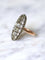 Bague marquise ancienne en or rose, argent, et diamants 58 Facettes