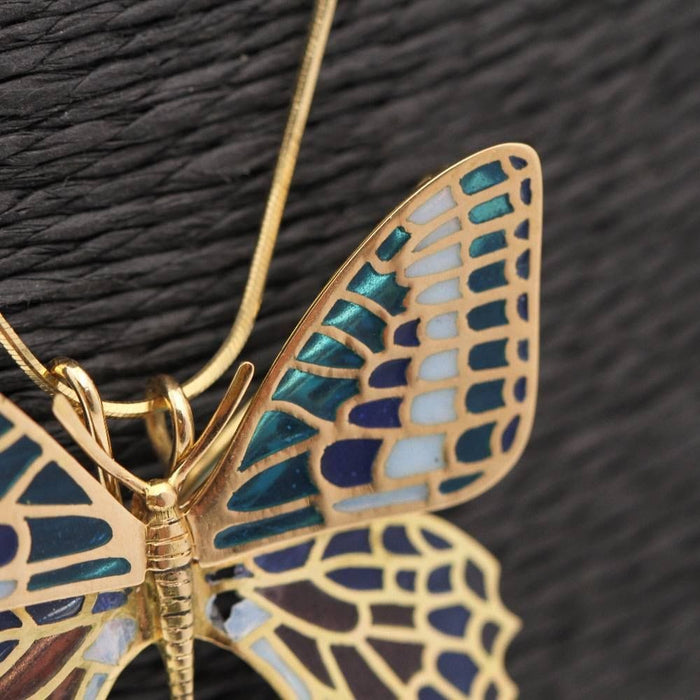Pendentif Butterfly in gold and enamel. Double function. 58 Facettes N102948JC