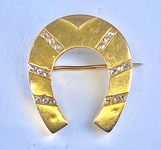 Broche Broche fer à cheval diamants 58 Facettes