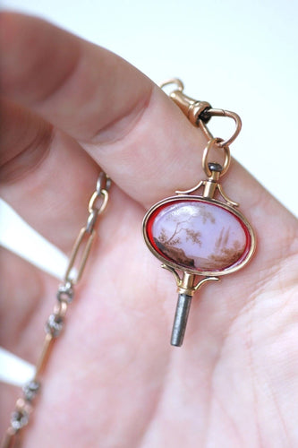 Pendentif Clef de montre paysage miniature sur verre 58 Facettes