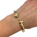 Cartier “Panthère” bracelet in yellow gold, tsavorites and onyx. 58 Facettes 31325