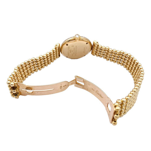 Montre Montre Cartier "Colisée", or jaune et diamants. 58 Facettes 33290
