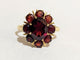 Bague Bague Marguerite or et grenats 58 Facettes