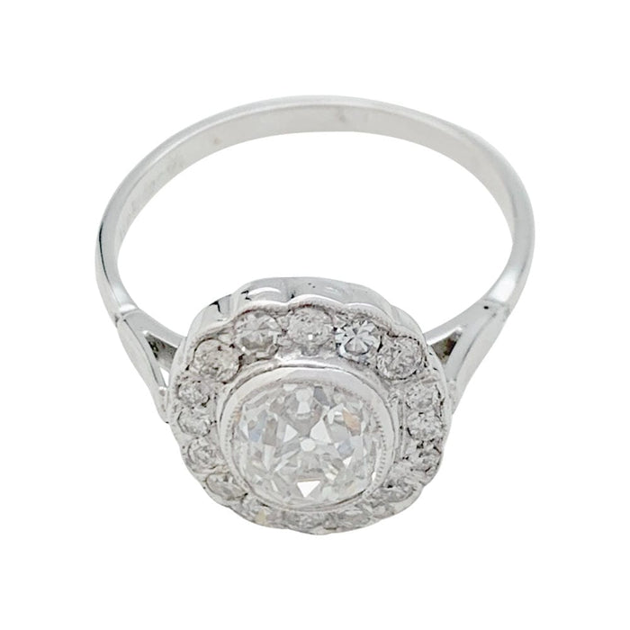 Bague 55 Bague marguerite en or blanc et diamants. 58 Facettes 31177