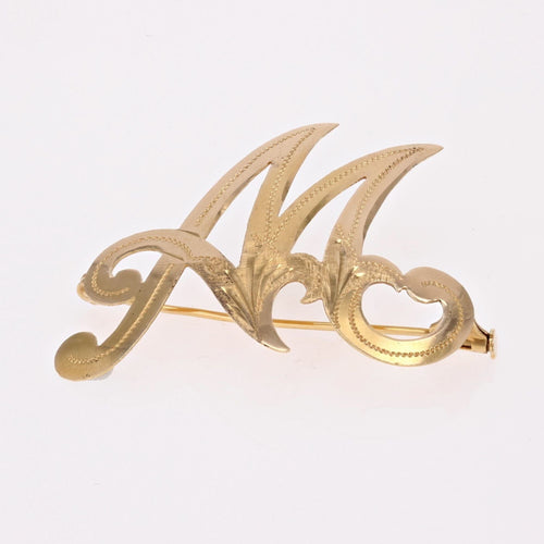 Broche Broche en or lettre M 58 Facettes CVBR48