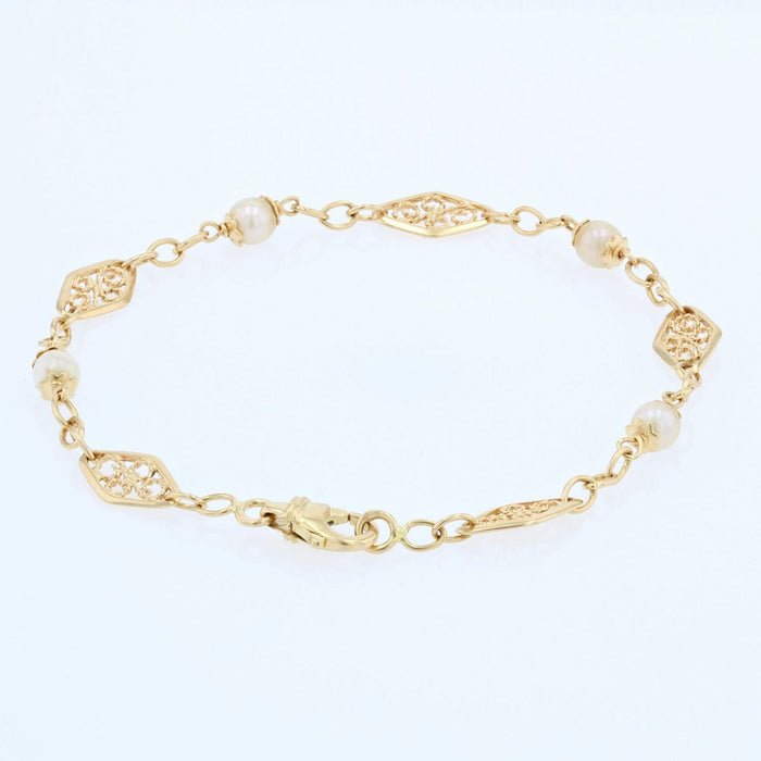 Bracelet Bracelet en or perles et filigranes 58 Facettes CVBR20