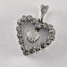 Pendentif Pendentif coeur en or blanc et diamants 58 Facettes 5603