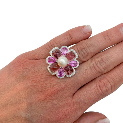Bague 52 Bague Chanel, "San Marco", or blanc, perle, saphirs roses, tourmalines roses, diamants. 58 Facettes 31344