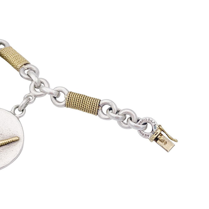 Bracelet Bracelet vintage Hermès, "Golf", or et argent. 58 Facettes 32780