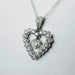 Pendentif Pendentif coeur en or blanc et diamants 58 Facettes 5603