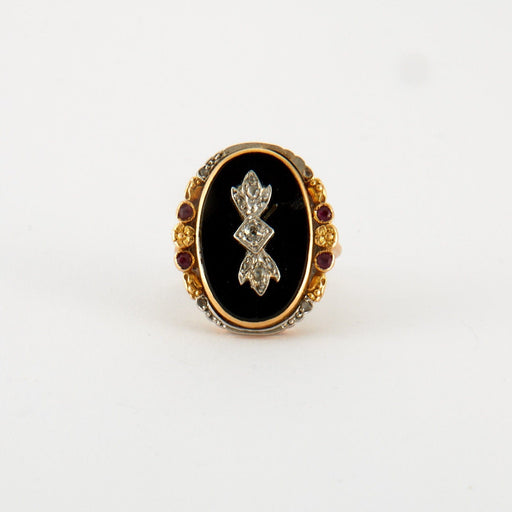 Ring 52 Ring in Yellow Gold, diamonds & rubies 58 Facettes