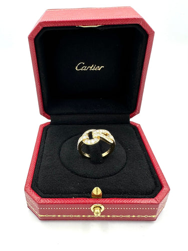 Bague 52 CARTIER. Collection Agrafe, bague en or jaune et diamants 58 Facettes