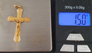 SMALL CROSS YELLOW GOLD WITH CHRIST pendant 58 Facettes