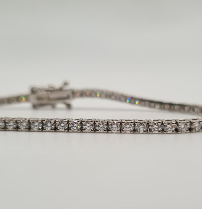 Bracelet Bracelet tennis or blanc 18 carats serti de diamants 58 Facettes