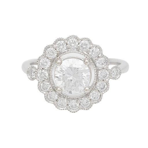 Bague 52 Bague marguerite en or blanc et diamants. 58 Facettes 31236