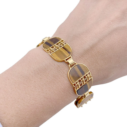 Bracelet Bracelet vintage, or jaune, oeil de tigre. 58 Facettes 32318