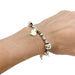 Bracelet Bracelet breloques Dodo, argent et or. 58 Facettes 31776