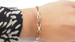 Bracelet Bracelet vintage en or jaune, rubis calibrés et diamants 58 Facettes 31672