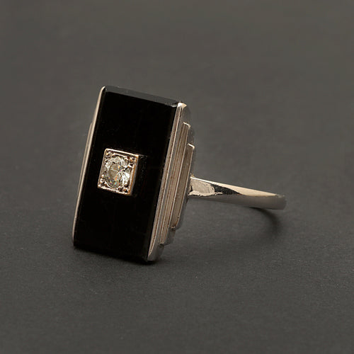 Bague Bague Art Déco en or gris, onyx et diamant "Blink" 58 Facettes 1966