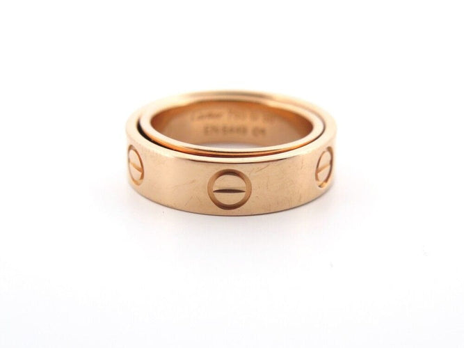 Bague 50 bague CARTIER double love en or rose 18k pendentif 58 Facettes 256980